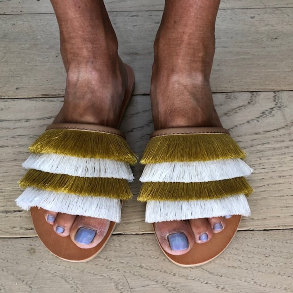 Fun furry fringe slides from Sundance. NEW in box!